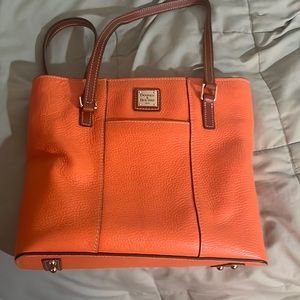 Dooney & Burke medium size tote. Beautiful color clementine